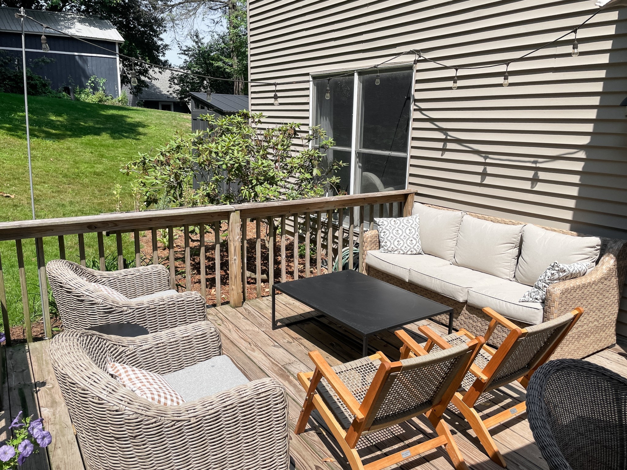 My brand new outdoor furniture I bought last spring from Walmart.  

Swivel chairs.  Black coffee table.  Outdoor sofa.  Wicker chairs.  

#LTKSeasonal #LTKHome #LTKOver40