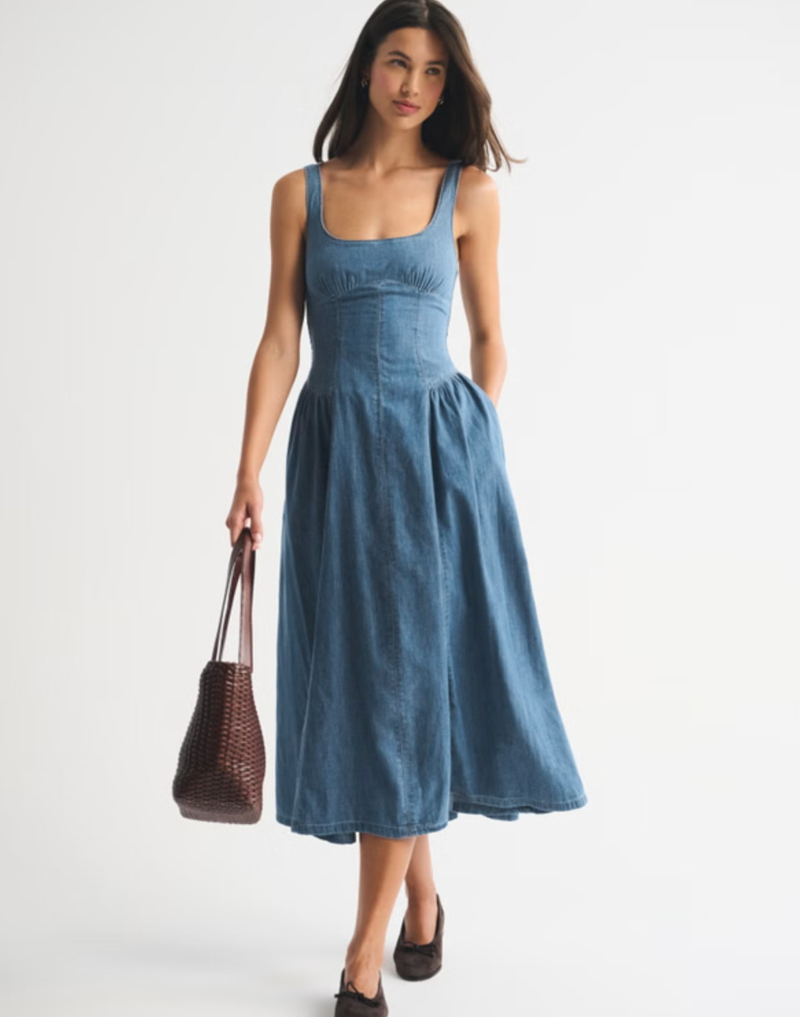 Effortless and flattering 🤍 The Abercrombie A&F Bra-Free Dylan Midi Dress is part of their bra-free collection, designed with built-in support (removable pads!) so you can skip the bra. It features a scoop neckline with delicate picot trim, adjustable straps, back smocking, and a dipped waist that flows into the prettiest skirt. The classic poplin fabric makes it perfect for everyday wear, brunch, or dressing up with heels ✨ 

 #LTKSpringSale #LTKgrwm #LTKootd