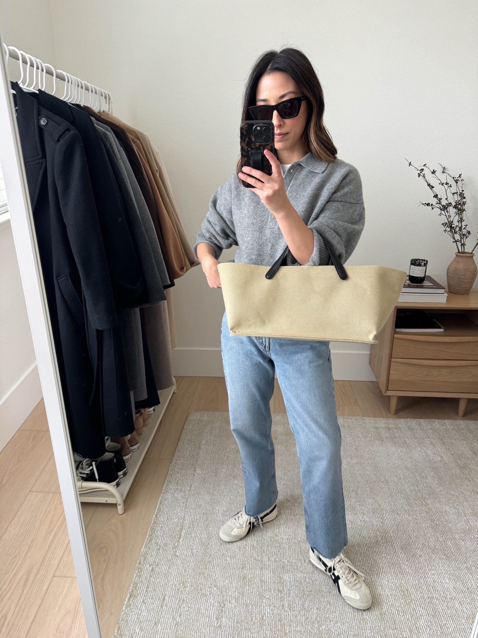 Elevated basic outfits by picking more elevated or interesting pieces. 

Reformation sweater xs (runs oversized)
AGOLDE Valen jeans 25. Cut hems
Onitsuka Tiger sneakers 4 mens. Run a half size big
Amazon tote
YSL Sunglasses 
Everlane box cut tee medium
J.Crew earrings
Dorsey James necklace 15"

#LTKShoeCrush #LTKPetite #LTKItBag