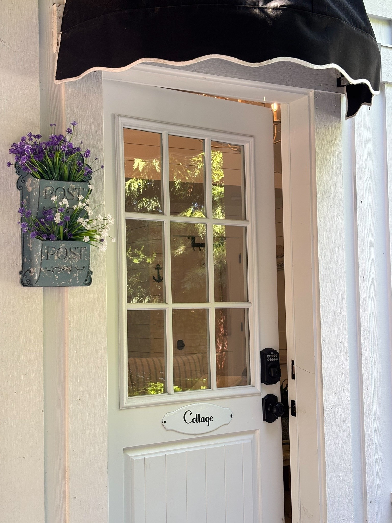 How adorable is this awning outside the Tiny Cottage? It comes in several color options. Linked the post box planter too (also several colors!),

#LTKSaleAlert #LTKHome #LTKSeasonal