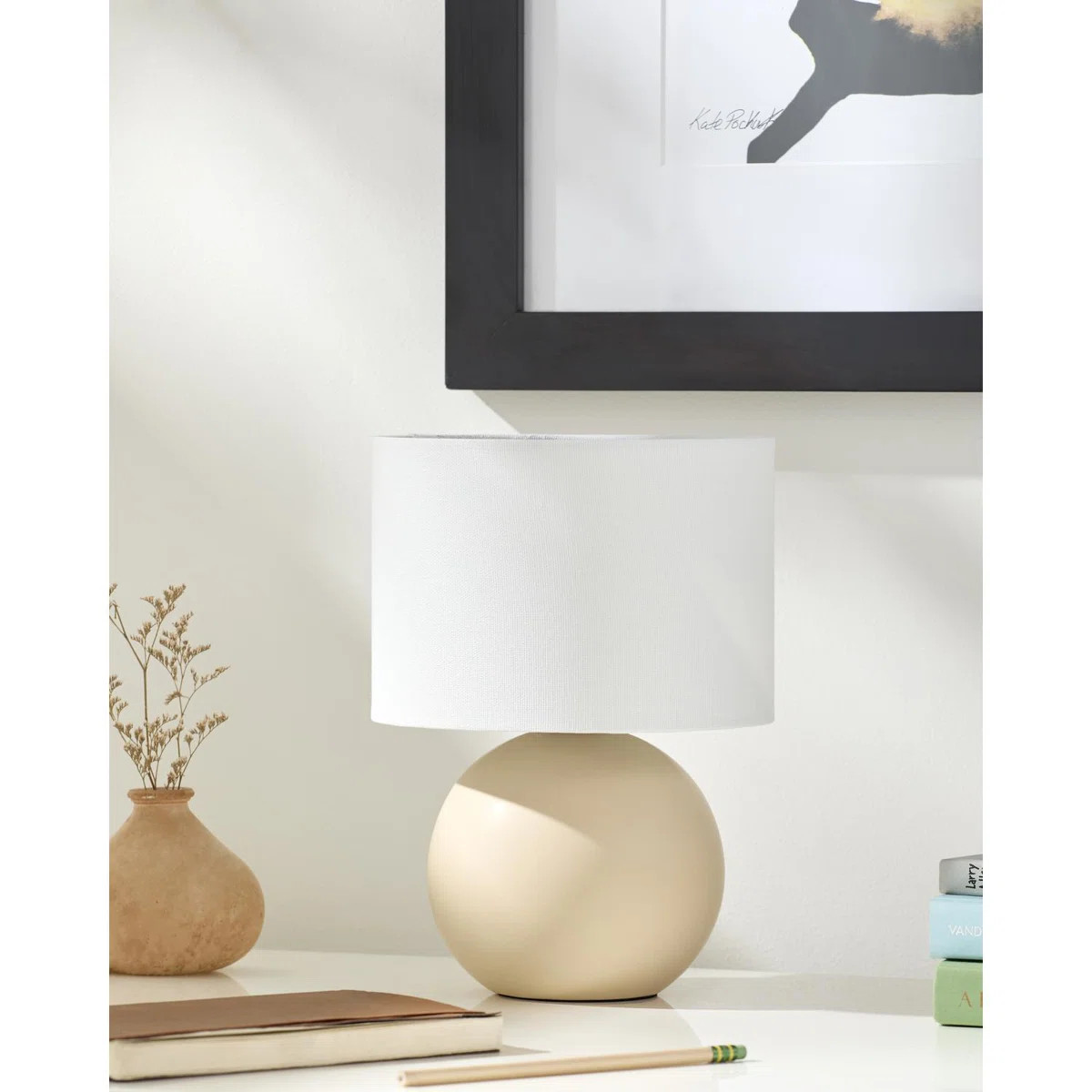 This table lamp brings a clean, modern silhouette to your space with its minimalist porcelain bas... | Wayfair North America