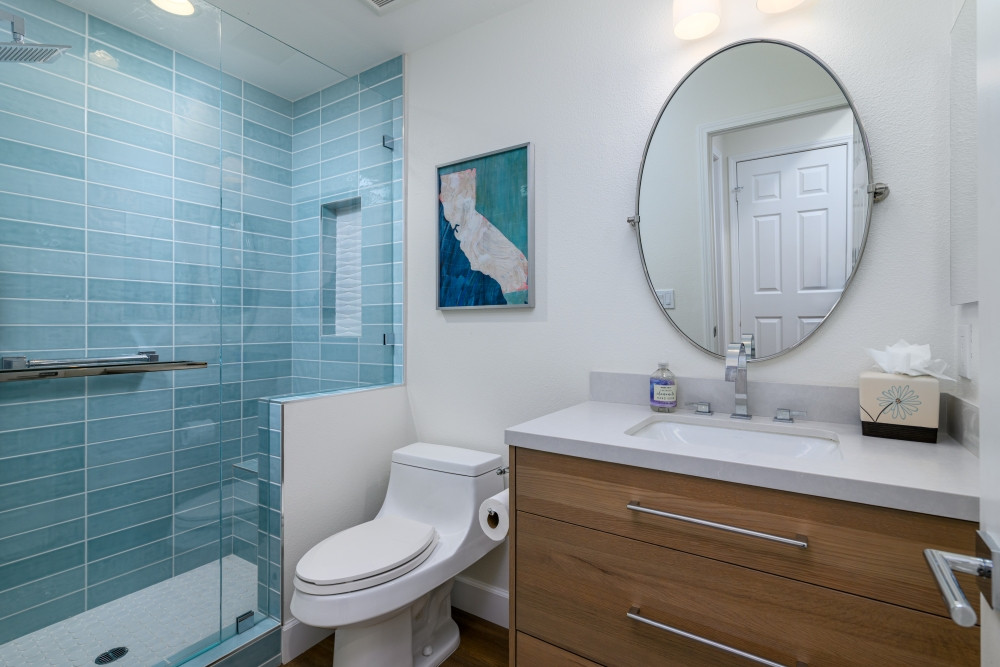The shower features a horizontally stacked subway tile with stunning blue variations, the subtle shift in tones brings a fresh ocean inspired vibe. In contrast with the gray circle shower floor and 3D triangle like tile in the niche all surrounded by a sleek chrome schluter.

#subwaytile #bluetile #tileinspiration #tiledesign #interiordesign #bathroomdesign #tilegoals #tilestyle #showertile #bluebathroom #blueshower #tilevibes #homerenovation #tilelove #tileaddiction #tilefeature #moderndesign #tileinstallation #designinspiration #boldtile #tiledetails #colorfultile #statementtile #tiletrends #bathroomtile #bathroomtiles #niche #showerdesign #showergoals 

 

#LTKHome