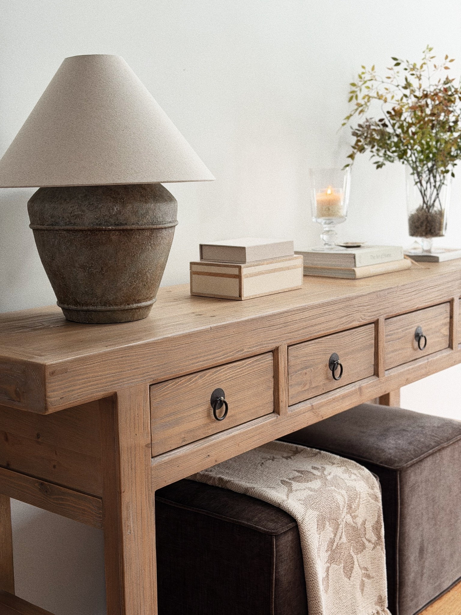 console table styling inspo

hurricane glass
neutral blanket
lampshade 
spring stems
ottomans

target home 

#LTKHome #LTKSeasonal #LTKSaleAlert