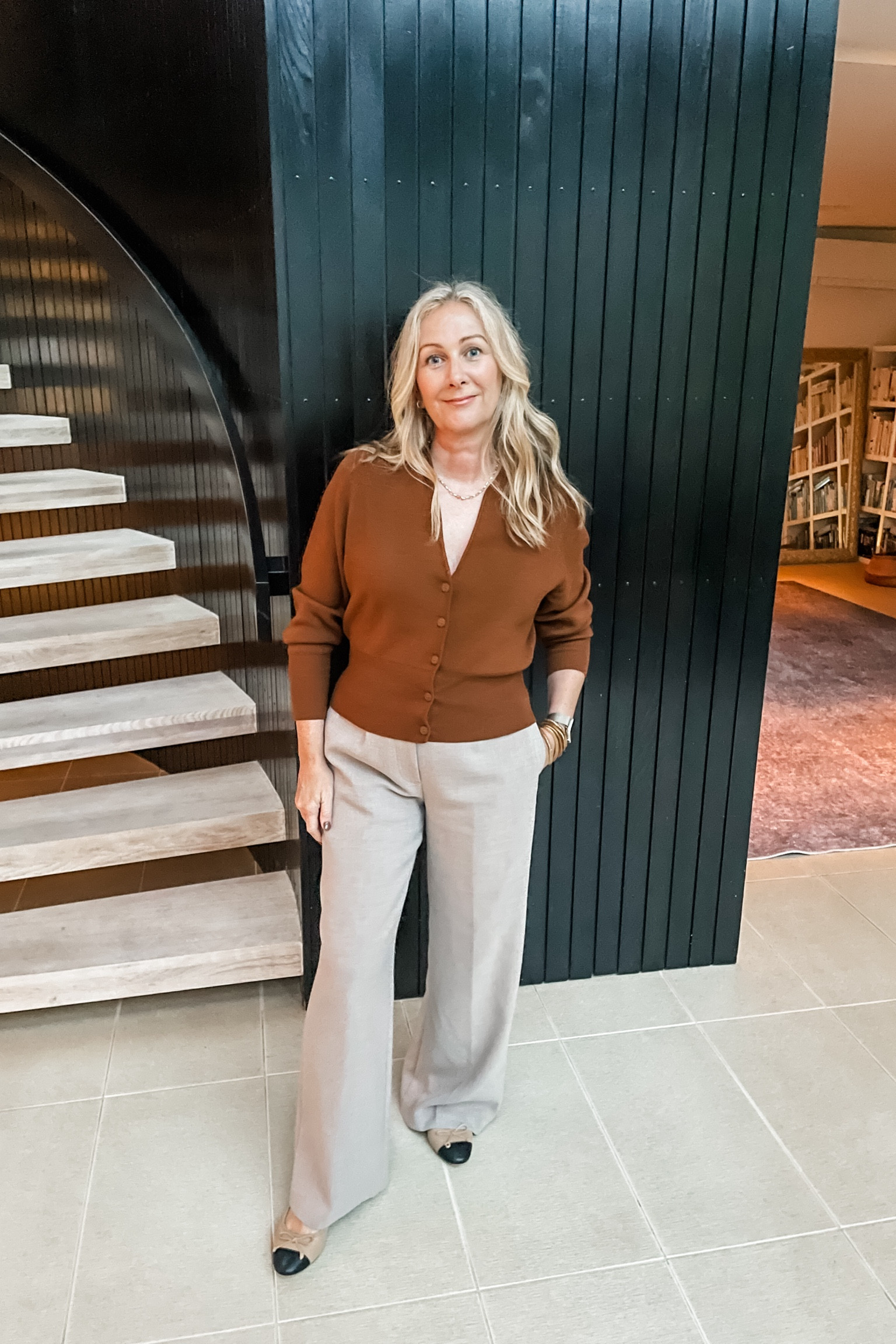 Smart casual. Outfit idea for a dinner out. Fitted cardigan and long, pleated pants. 

#LTKOver40 #LTKSeasonal #LTKStyleTip