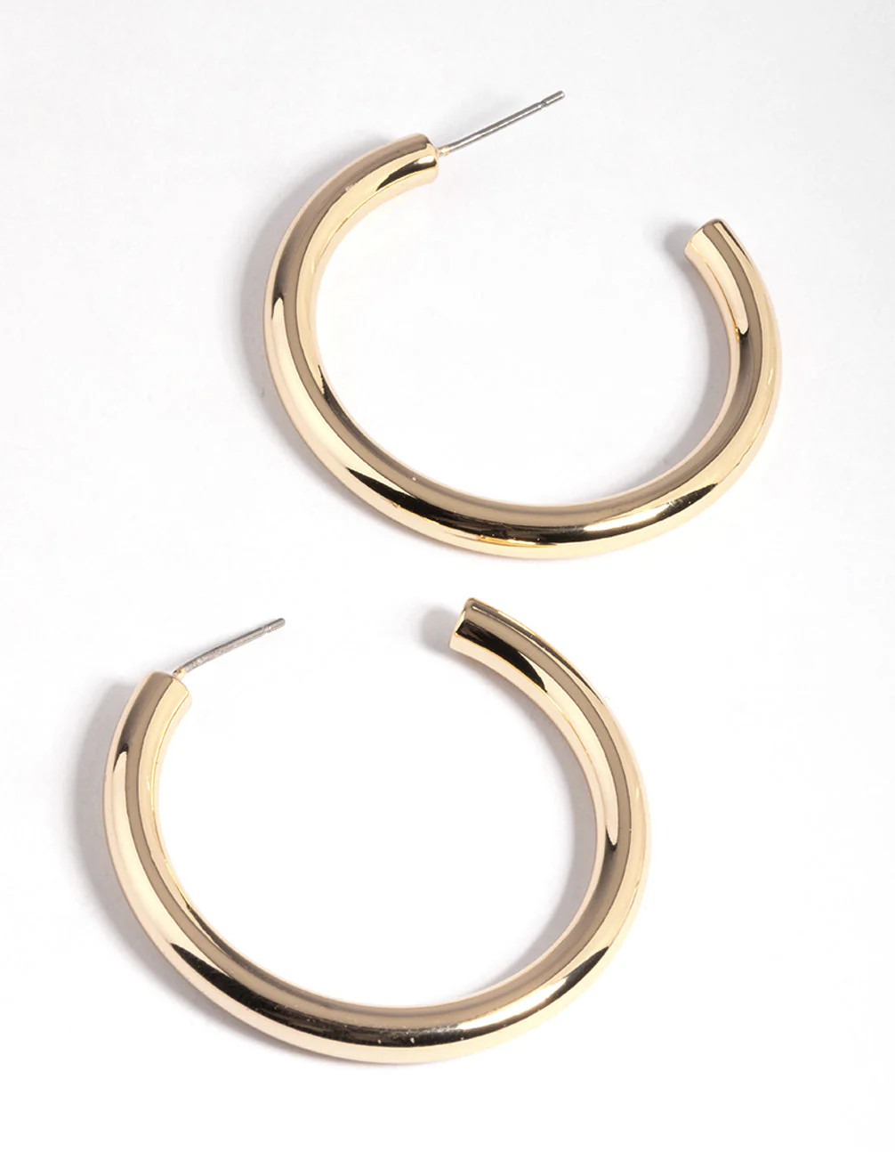 Gold Hoop Earrings | Care Tucker