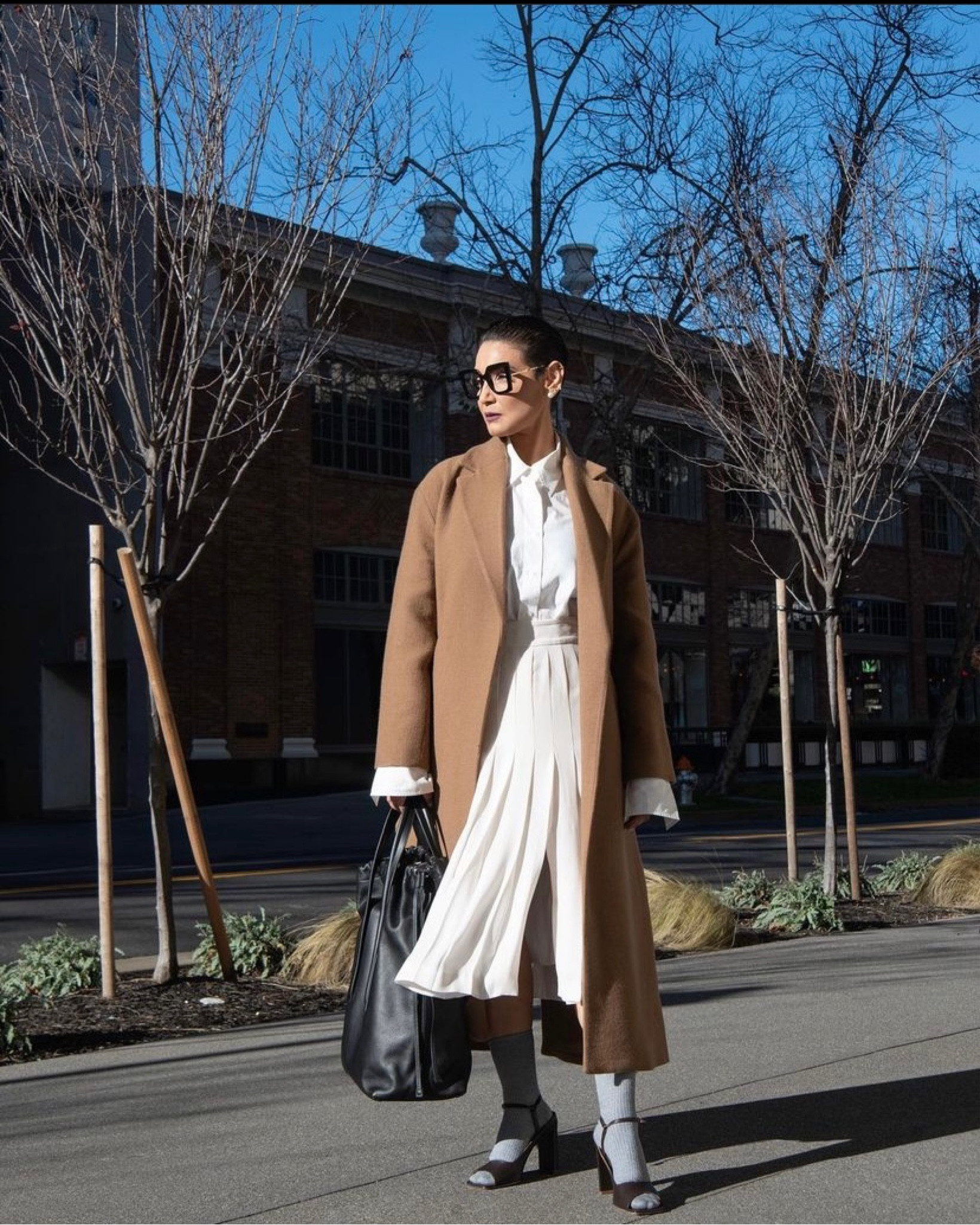 An outfit l've been wearing on repeat lately. My zara tailored wool coat with my anthropologie Bennet Buttondown shirt and this pleated midi which I got a decade ago from bananarepublic Grey Socks freepeople Thrills Victoria 3-pack sock Bundel worn with my current favorite shop_emar Nisa heels and my Black Flex large carry-all tote (is still available ) roztayger

#LTKitbag #LTKstyletip #LTKworkwear