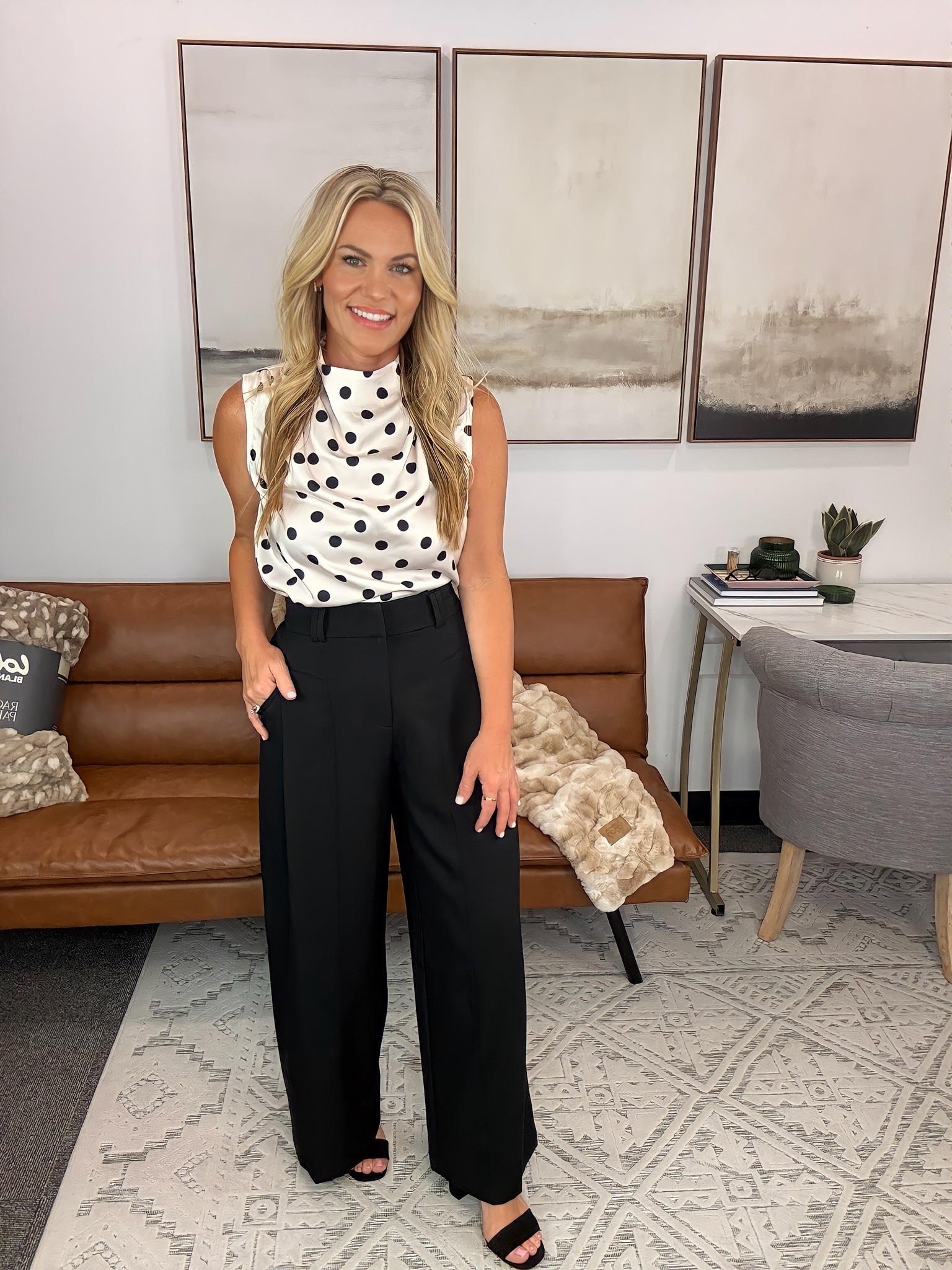 This workwear look feels classic with just the right amount of personality. The draped polka dot blouse softens the structured wide-leg trousers, creating an outfit that’s comfortable for long office days but polished enough for meetings, presentations, or dinner afterward.

Office outfit, business casual style, polka dot blouse, wide leg trousers, professional wardrobe, workwear inspiration, office fashion, classic style, elevated work outfit, AudrieDollins

#LTKWorkwear #LTKSeasonal #LTKootd