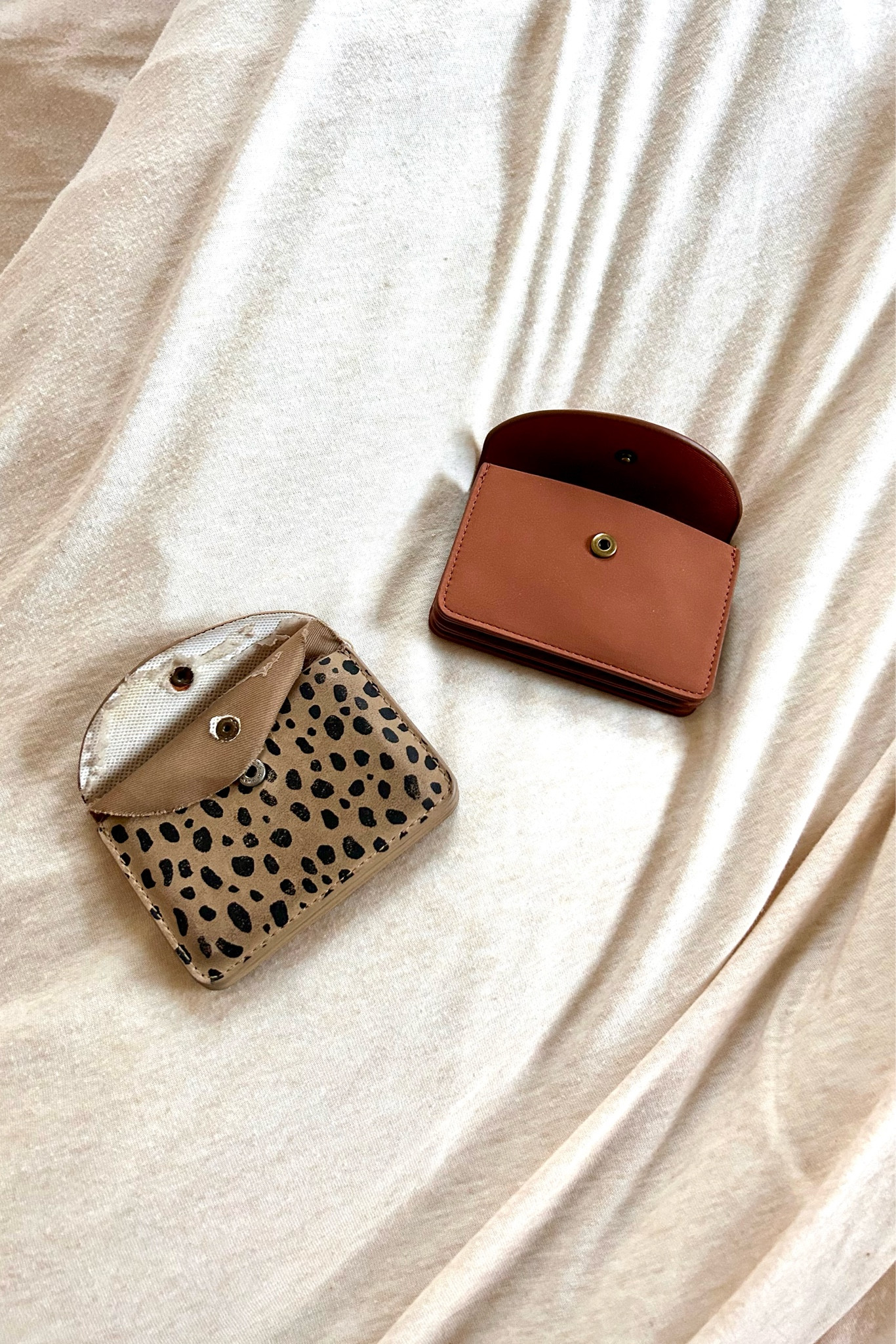 when you know your worth, you don’t settle • i’ve been using this cheetah print card wallet for a couple of years (clearly it was well loved) and it finally started to fall apart 🥲 this little thing has been with me when my wallet was thick and when my wallet was thin. i’m grateful to have had it for so long. and i’m happy to have a replacement ☺️ i made a vow to myself last fall that id stop letting myself carry around tattered things. i either mended them or i replaced them. why? because i want my worth to be tangible. visible to the naked eye. and that means not settling for brokenness. thankfully, these cuties are super affordable and i’ll be grabbing the black one soooon

#LTKstyletip #LTKitbag #LTKGiftGuide