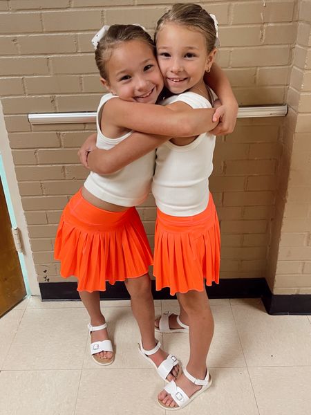 The twins are twinning👯‍♀️

Neon coral, white tank top, skirt, sandals, bows, kids, girls, Dillards, Gianni Bini, Amazon, Walmart, Kate spade, jewelry, 

#LTKStyleTip #LTKShoeCrush #LTKKids