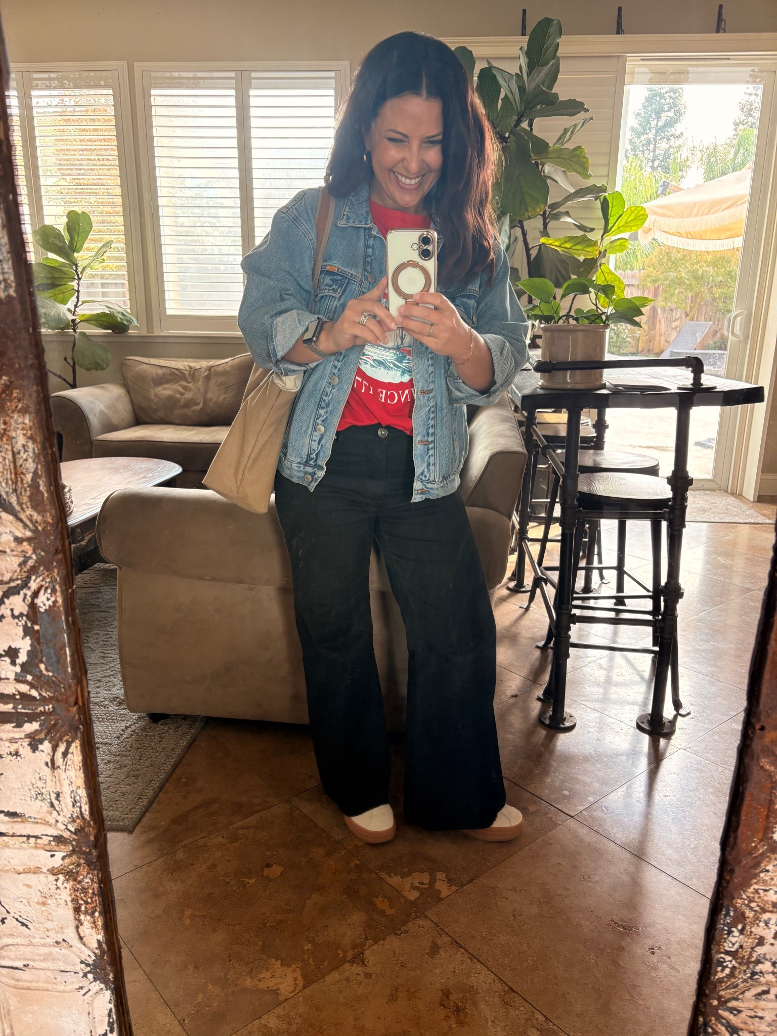 Day four of parent-teacher-student conferences! Wearing one of my favorite social studies teacher shirts - “Spilling the tea since 1773”. With my oversized denim jacket, wide leg black jeans and platform sneakers. 

#LTKOver40 #LTKWorkwear #LTKPetite