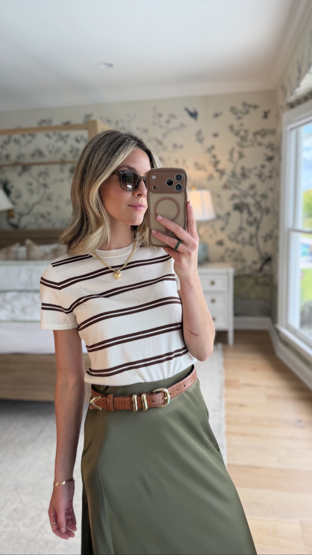 little pre-fall roundup of everything I picked up from @Tuckernuck , and I genuinely love every piece. They're all those elevated staples that mix and match so well through the season.

A few standouts:

 • The silk skirt is one of my most-worn pieces (I also own it in wine!) and looks just as good with a tank now as it will with sweaters later.
 • The brown scarf is such a fun styling piece. Wear it as a scarf top, around your shoulders, or tied at your waist.
 • The faux suede dress is incredibly flattering and feels so polished.
 • Those suede heels are some of my favorites—they're comfortable enough to actually wear all day.

Sizing:
 
• Denim: size 25 (sized down one)
 • Belt: XS/S
 • Everything else size small 

#TuckernuckPartner

#LTKSeasonal #LTKootd