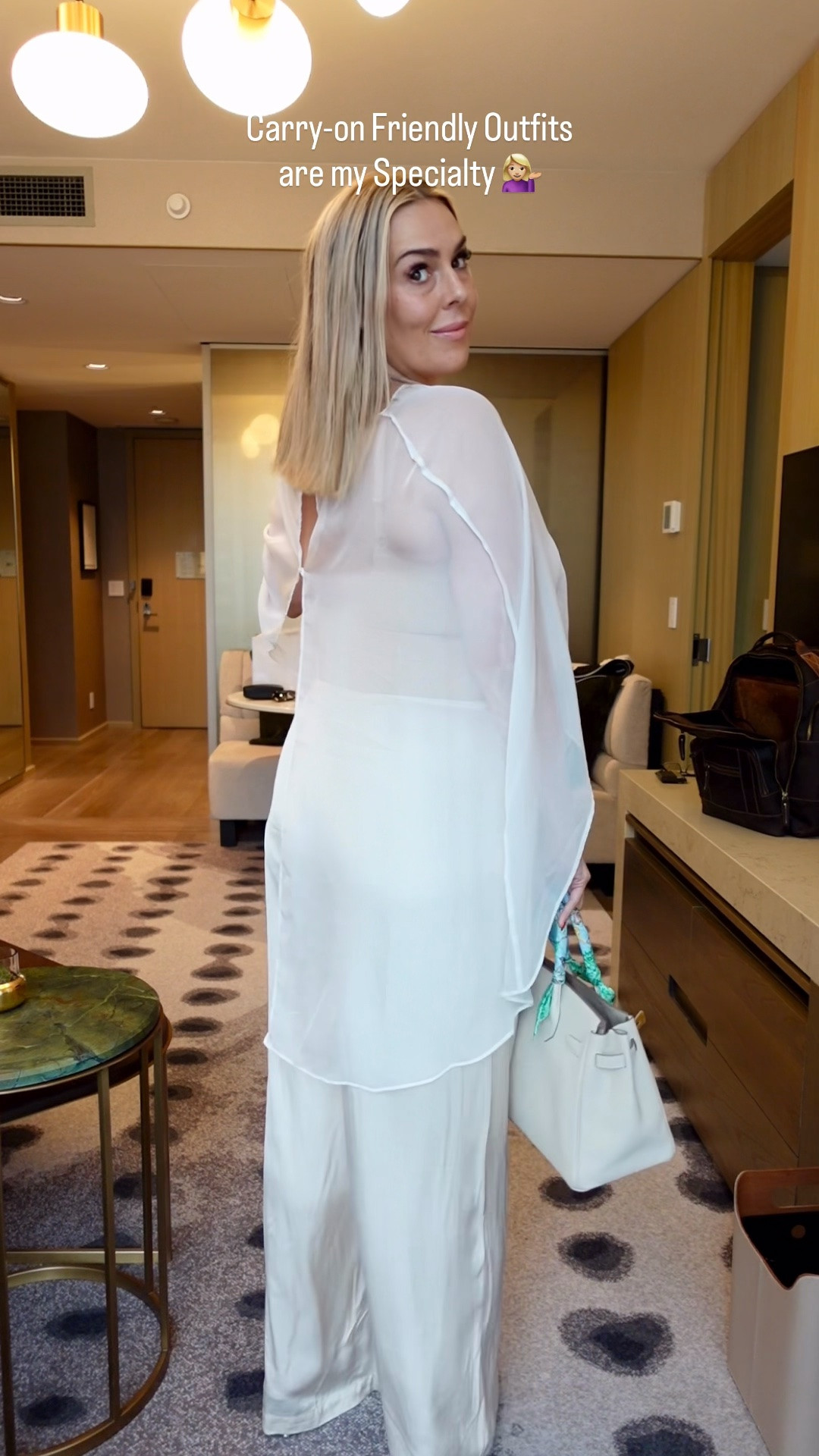 Paired these satin wide leg pants with a nude bodysuit and white sheer cape top. Perfect thin and light materials for traveling 🤍🤍

#LTKootd #LTKMidsize #LTKU