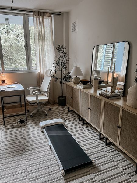the perfect walking pad to blend into my home office aesthetic! 

seriously hooked on this thing. On it as we speak! 

Walking pad, storage cabinet, mirror, office chair, desk, lamp, Stanley cup, candles, indoor outdoor rug, neutral home decor, olive tree 

#LTKhome #LTKfitness