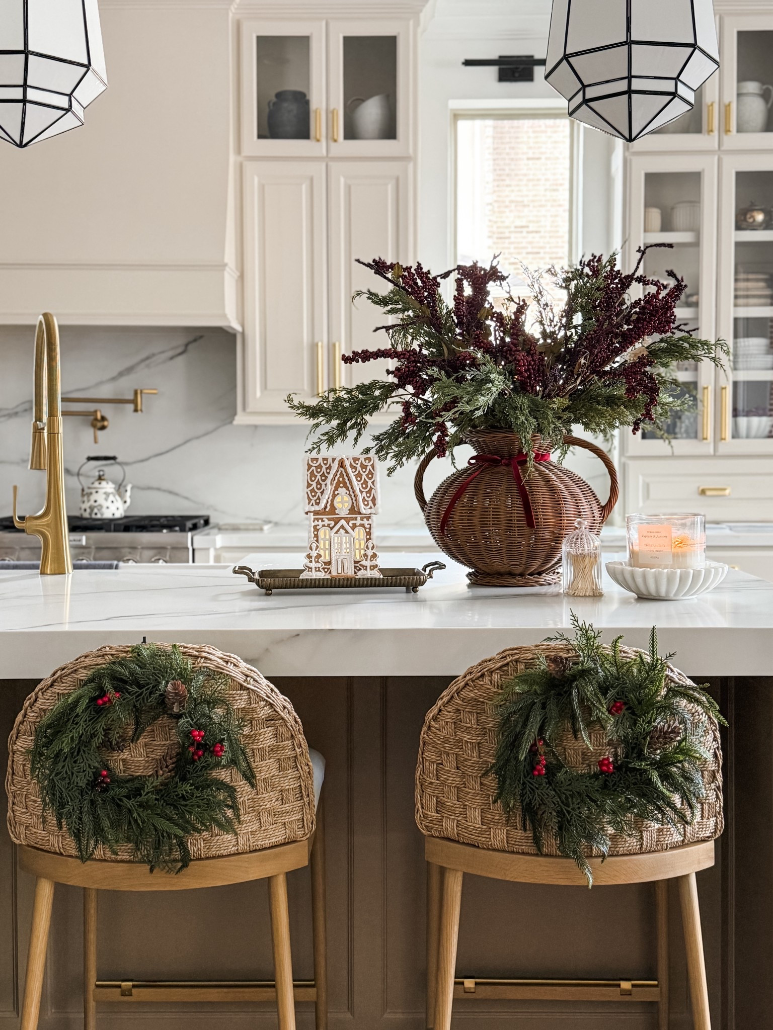 Sharing all the cozy details from my Christmas kitchen today. I dressed the space with burgundy berry stems, the prettiest gingerbread house, and mini wreaths tied to the back of my bar stools with velvet ribbon. A warm, cozy holiday candle pulls everything together for that welcoming Christmas glow.

If you’re decorating your kitchen for the holidays, these pieces add the perfect festive touch without overwhelming your space. Linking all my Christmas kitchen decor, gingerbread house decor, holiday stems, and velvet ribbon finds for you. 

#LTKHome #LTKHoliday #LTKStyleTip