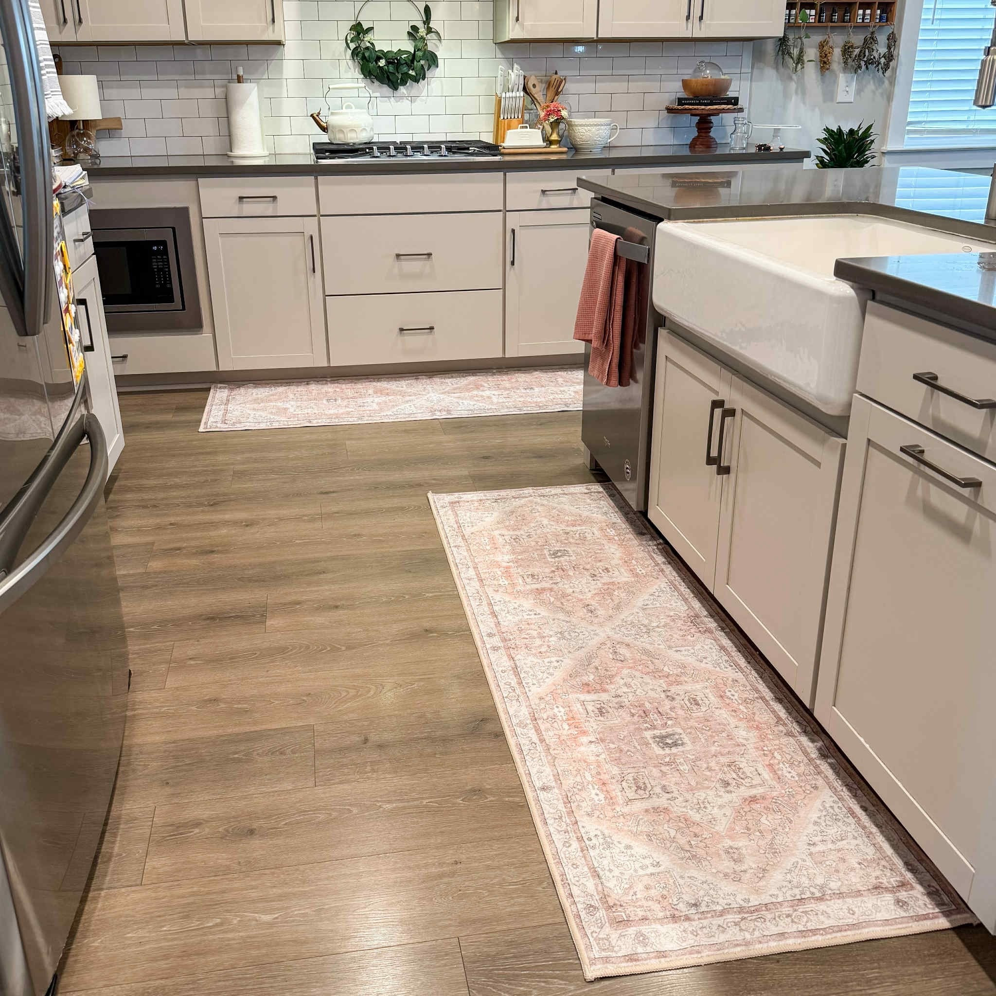 Added more coziness to the kitchen with runner rugs! So soft under my feet, and the colors are so beautiful with light pink, tan, and mauve. These are the 2x6 size. They have anti slip built in on the bottom, and they unboxed beautifully with no strong odors. They are wildly inexpensive too!

#LTKStyleTip #LTKHome #LTKSaleAlert