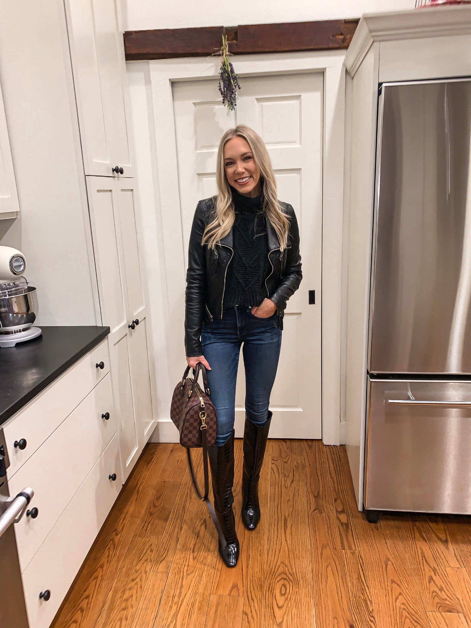 Black knee high boots, black faux leather jacket, good American dark wash jeans, skinny jeans with boots, black knit sweater, fall outfit, going out outfit, date night outfit 

#LTKSeasonal #LTKunder50 #LTKunder100