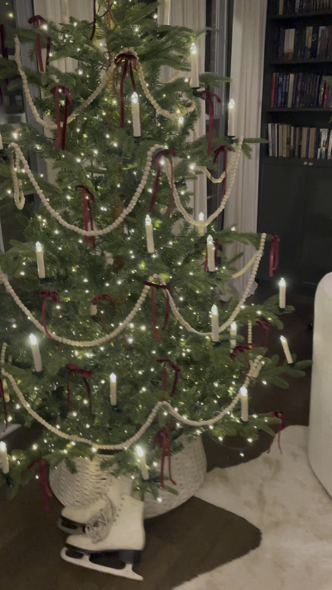 Adding some deep red ribbon to my library tree...

#LTKHoliday #LTKWatchNow #LTKHome