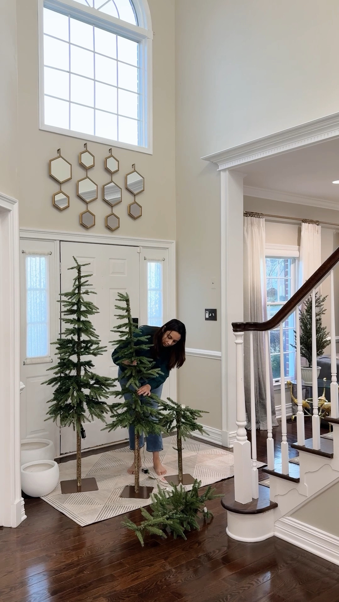 Foyer details - sprinkled holiday ✨ in the foyer finally! Love these alpine trees and the tall top Christa’s trees with lights  @wayfair #onlyatwayfair #wayfairdeals
Black Friday deals 

#LTKSeasonal #LTKHome #LTKHoliday