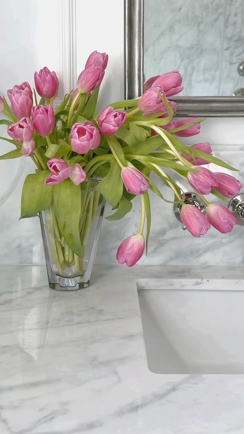 The prettiest tulips arranged in a timeless flared crystal vase for spring 🌷

#LTKSeasonal #LTKHome #LTKSaleAlert