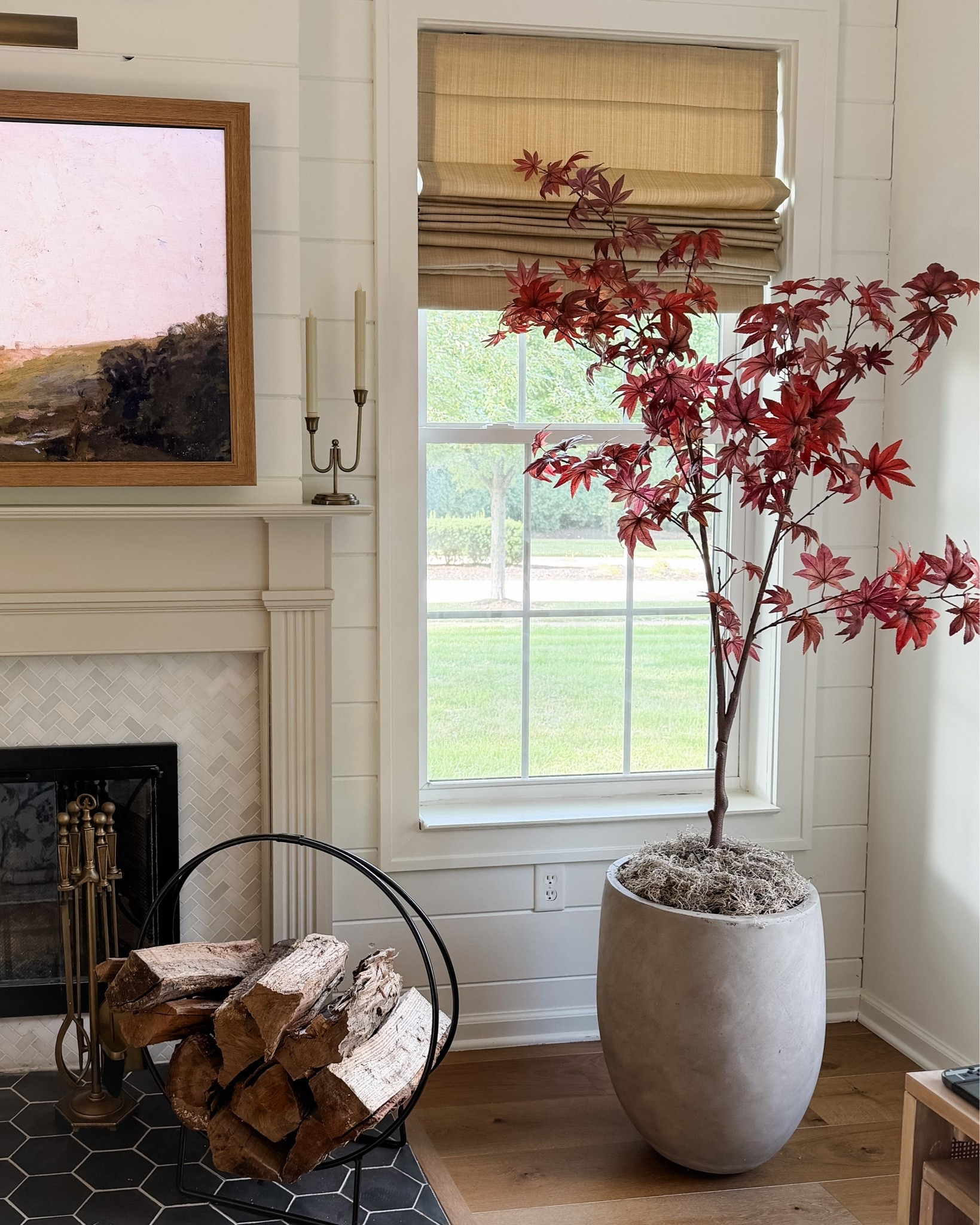 Added some height to the infamous Target maple tree by using a taller planter! The six foot height was just a little too short for the 9 foot ceilings in our living room.

#LTKHome #LTKSeasonal