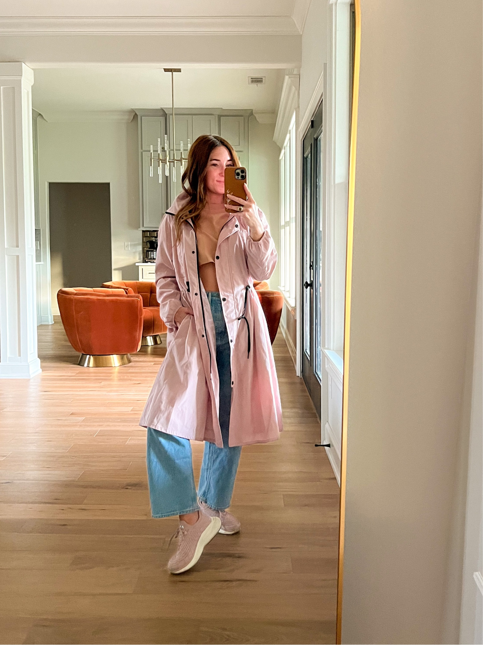 This rain jacket is one of my favorite purchases of the year. I love that the hood zips into the collar if you don’t want it out, has pockets, and an adjustable scrunch waist to give you shape while wearing. The length is perfect and I love the silhouette.  

Rain jacket, Nordstrom, outerwear, rain coat, pink jacket 

#LTKBacktoSchool #LTKworkwear #LTKshoecrush