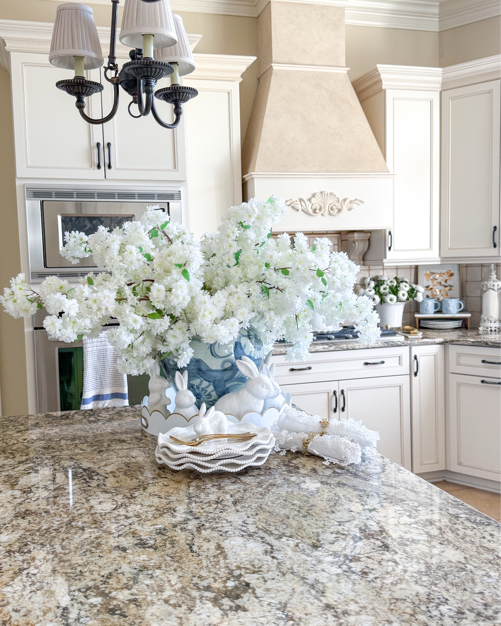 Spring kitchen views 💙🌿🤍

Blue and white vase, blue and white decor, lace napkins, melamine plates, everyday plates, wayfair finds, gold napkin rings, blue mugs, spring centerpiece, spring flowers, faux flowers, spring arrangements, kitchen decor, traditional home, spring decor, spring kitchen 

#LTKHome #LTKSeasonal #LTKMothersDay