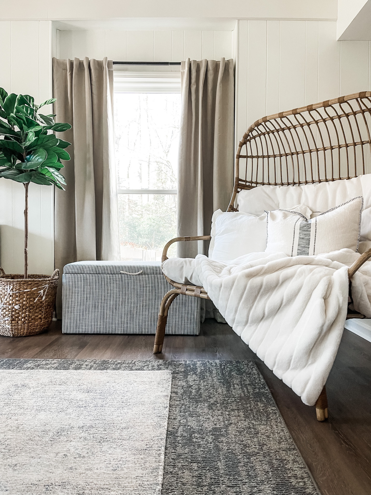 Cozy corner in the playroom 🤍 

#eggchair #patiochair #storageottoman #fiddleleaffig #budgetcurtains #target 

#LTKfamily #LTKkids #LTKhome