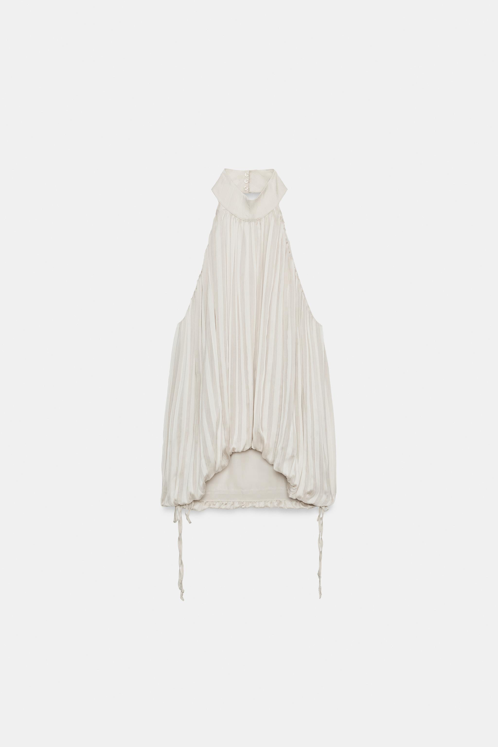 ZARA WOMAN COLLECTIONHalter neck top with an open back. Featuring pleated fabric detailing. Adjus... | Zara UK