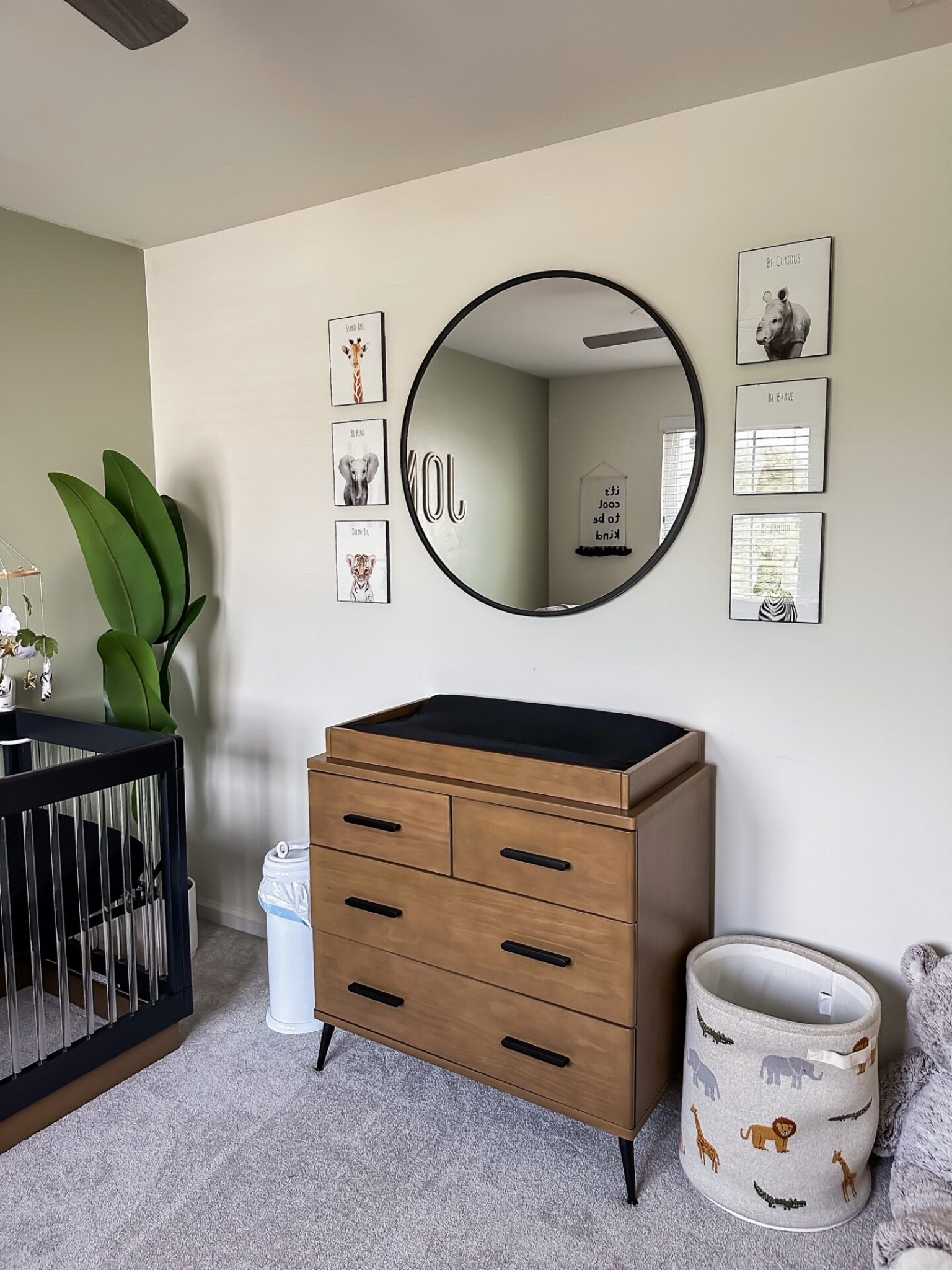  Baby boy nursery // safari nursery inspiration // delta children nursery dresser // big round mirror // nursery animal prints // amazon home decor

#LTKfamily #LTKhome #LTKbaby