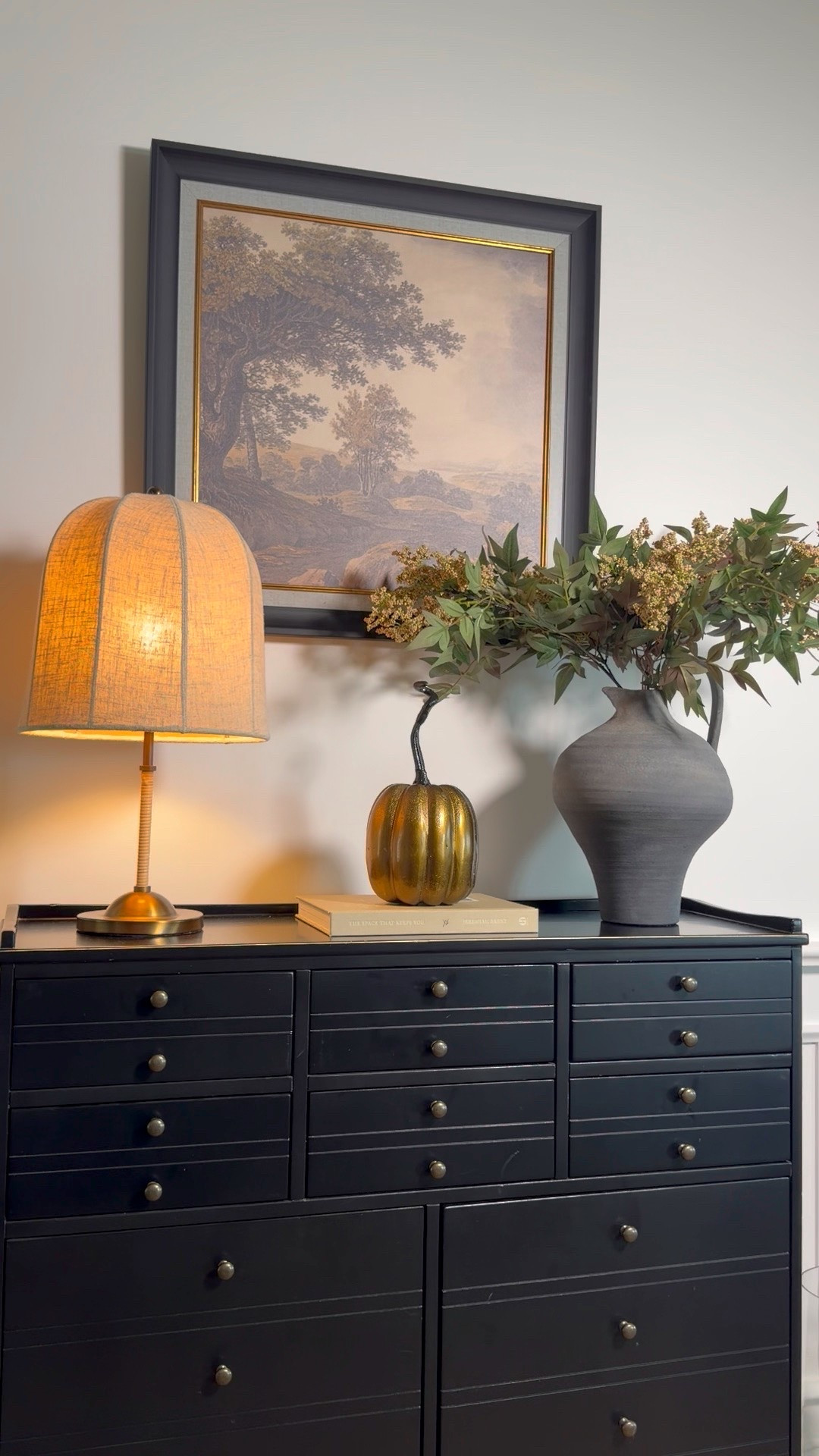 I love the colors in this art for fall. Pairs so nicely with the green berry stems and this pumpkin decor.

#LTKSeasonal #LTKHome #LTKSaleAlert