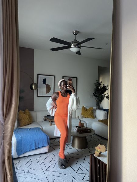 Long Orange dress, cream puffy sweater 

#LTKbeauty #LTKstyletip #LTKfindsunder100