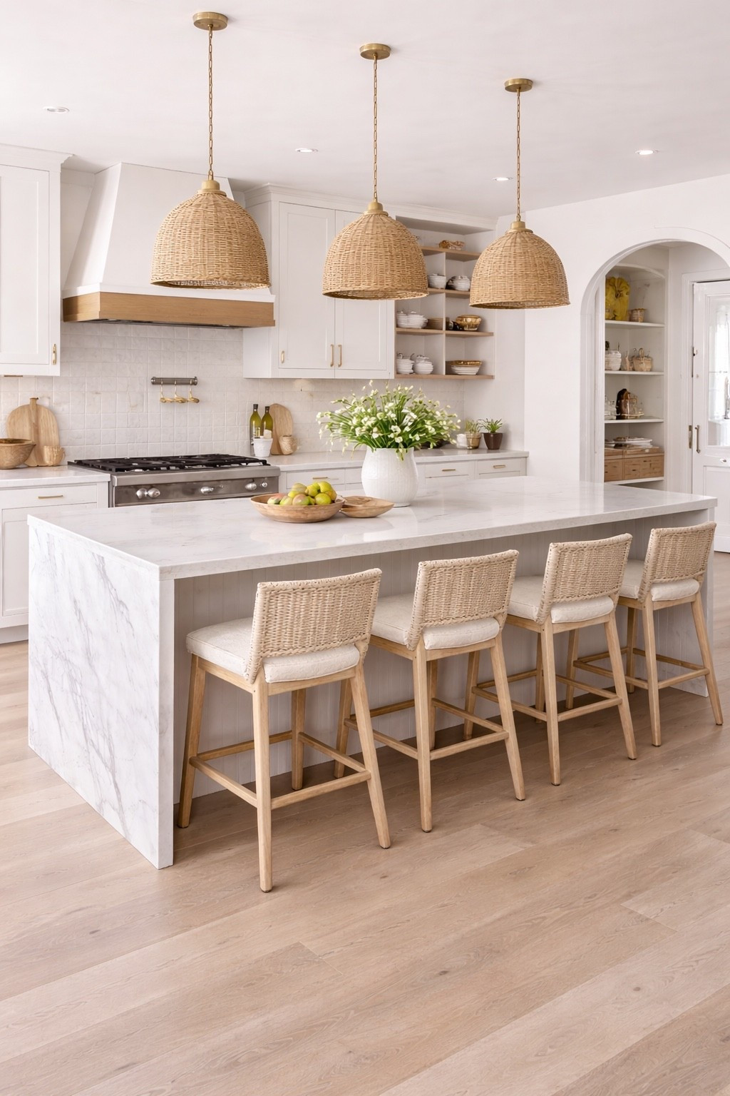 A stunning modern neutral kitchen featuring a light stone island, natural wood accents, and woven bar stools for a warm, timeless look.
This design blends minimalist elegance with organic textures — perfect inspiration for bright kitchens, coastal modern homes, and luxury neutral interiors.
Save this idea if you love calm, airy spaces with elevated details 🤍#modernkitchen  
#kitchenisland  
#neutralhome  
#barstools  
#organicmodern  
#coastalkitchen  
#lightwood  
#kitchendesign  
#luxuryinterior  
#homeinspo

#LTKHoliday #LTKHome #LTKSeasonal
