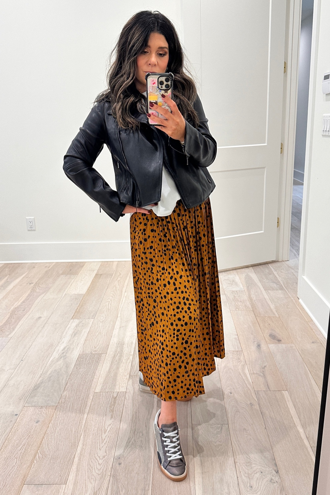 Loving the skirt. So versatile. I’m wearing a white t shirt. And leather jacket from tjmaxx. 

#LTKOver40 #LTKBeauty #LTKStyleTip