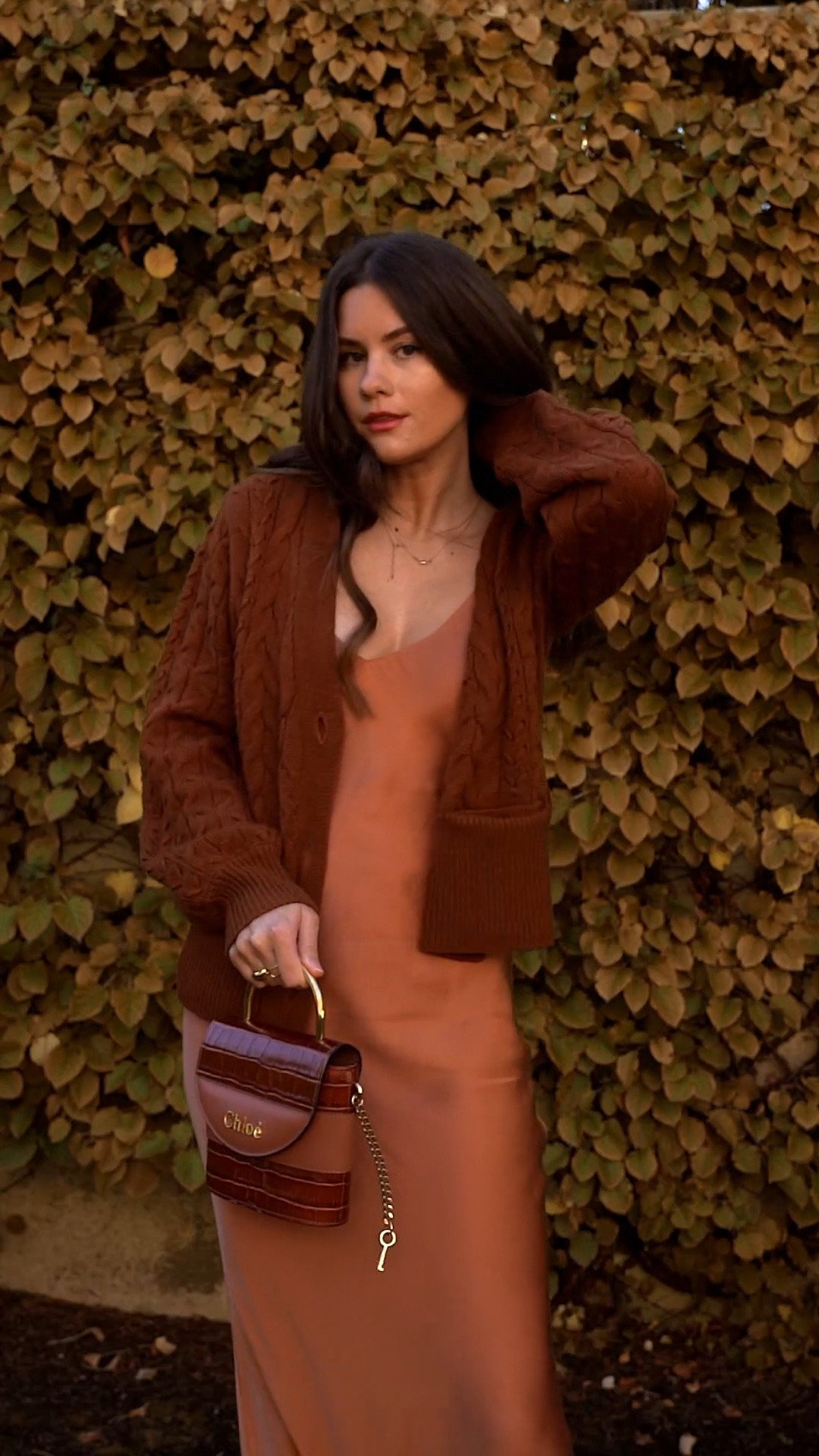 Fall outfit idea: style a brown satin slip dress with a cozy cable-knit cardigan for an effortless, chic layered look. Perfect for brunch, date night, or fall events. 🍂 #FallOutfitIdeas #LTKFallStyle #SatinDressOutfit #CardiganStyl

#LTKStyleTip #LTKSeasonal