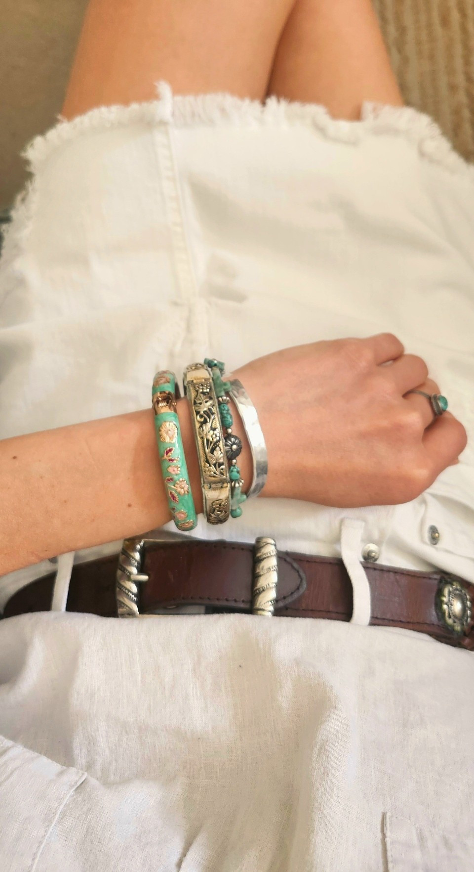 Jewelry stack. Bracelets. Denim skirt. Turquoise ring. 

#LTKSeasonal #LTKSaleAlert