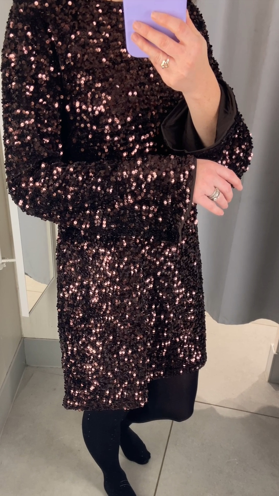 Holiday party ready ✨ This brown sequin dress is perfect for festive cocktails, dinners, or any winter celebration. Loving the sparkle and easy fit—so chic with heels! I’m wearing a size small. Christmas outfits, sequin trousers, party outfits, sequins, Christmas party outfits, chocolate brown 

#LTKuk #LTKfestive #LTKpartywear