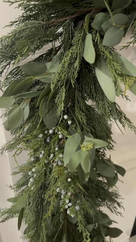Christmas garland using juniper branches, real touch eucalyptus, and cypress garland. 

Home decor coastal fireplace living room garland greenery crate barrel 

#LTKhome #LTKVideo #LTKHoliday