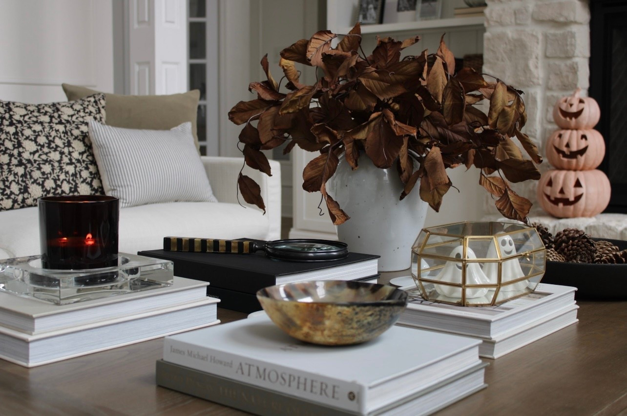 Fall coffee table styling 🤎🍂🎃

Ghosts + pumpkins on fireplace are from tj maxx. 

Use code: kate20 on all Alice lane decor! 
