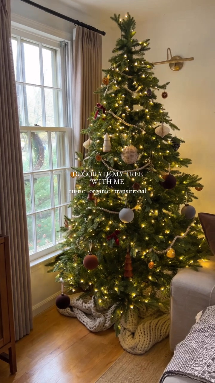 Decorate my Christmas tree with me! Most of these are affordable, even the McGee and Co ones are on sale this week! I tried to use lots of natural elements-woods, paper, dried oranges, etc to give a natural but nostalgic feel!

#LTKHome #LTKHoliday #LTKSeasonal