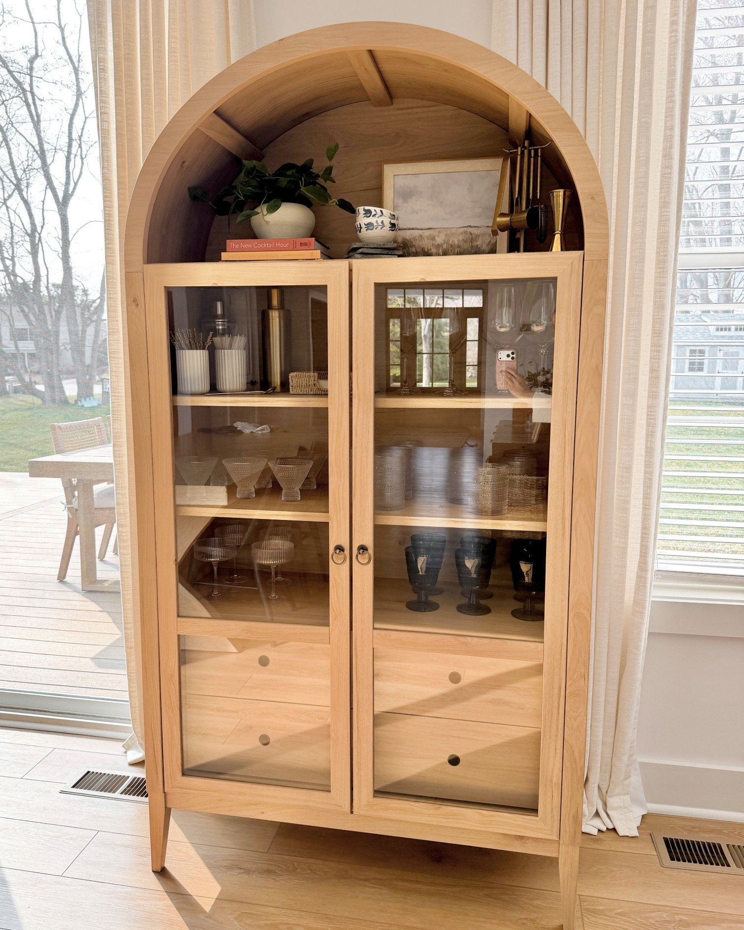 Arched bar cabinet styling, light wood bar cabinet, modern organic bar cabinet, glass door cabinet styling, neutral bar cabinet decor, home bar cabinet ideas, modern organic furniture, neutral home styling, wood cabinet decor ideas, living room bar cabinet, decorative cabinet styling, organic modern home decor, neutral shelf styling, light wood furniture, curated bar cabinet, modern organic living room, neutral aesthetic home, built in bar cabinet inspiration, bar cabinet organization, neutral decor styling

#LTKSaleAlert #LTKSpringSale #LTKHome