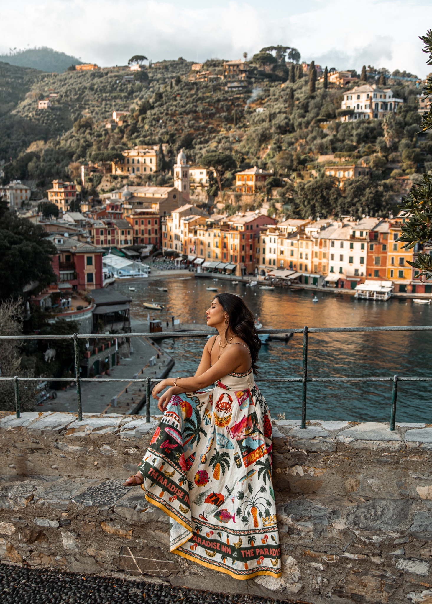 The perfect summer holiday dress. Fits true to size, a snug fit around the bust with a gorgeous flowing skirt. 