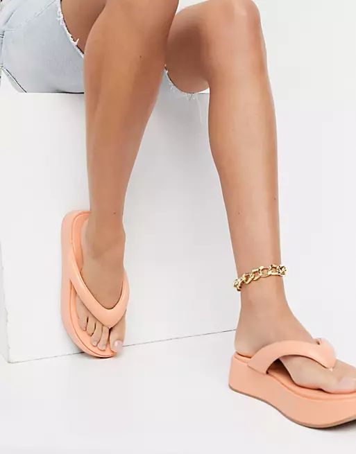 ASOS DESIGN Wide Fit Ferris chunky flip flop sandals in peach | ASOS (Global)