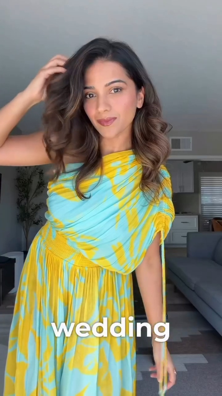Blue hues, soft drapes, and a little sparkle — the perfect wedding guest moment ✨

Comment “Link” for a direct DM to this outfit!

[wedding guest, flowy dress, one-shoulder outfit, blue outfit, wedding look, elegant style, indian fashion, festive edit, wedding season, crystal bag, minimal glam, statement earrings, effortless style, chic outfit, wedding ready, outfit inspo]