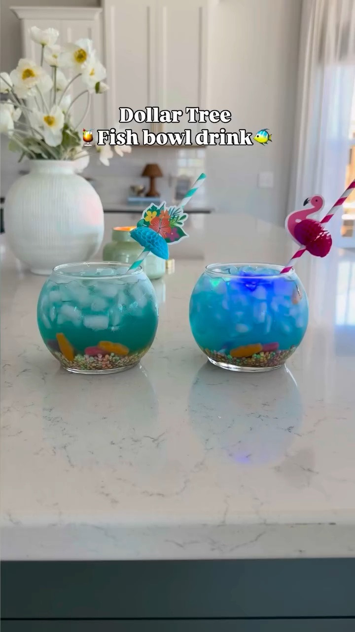 Fun drinks to make for a summer party ☀️🍹🐠

What you need:
Blue Gatorade
Lemonade
Swedish fish candy
Nerds
Ice

#dollartree #poolparty #ltk
