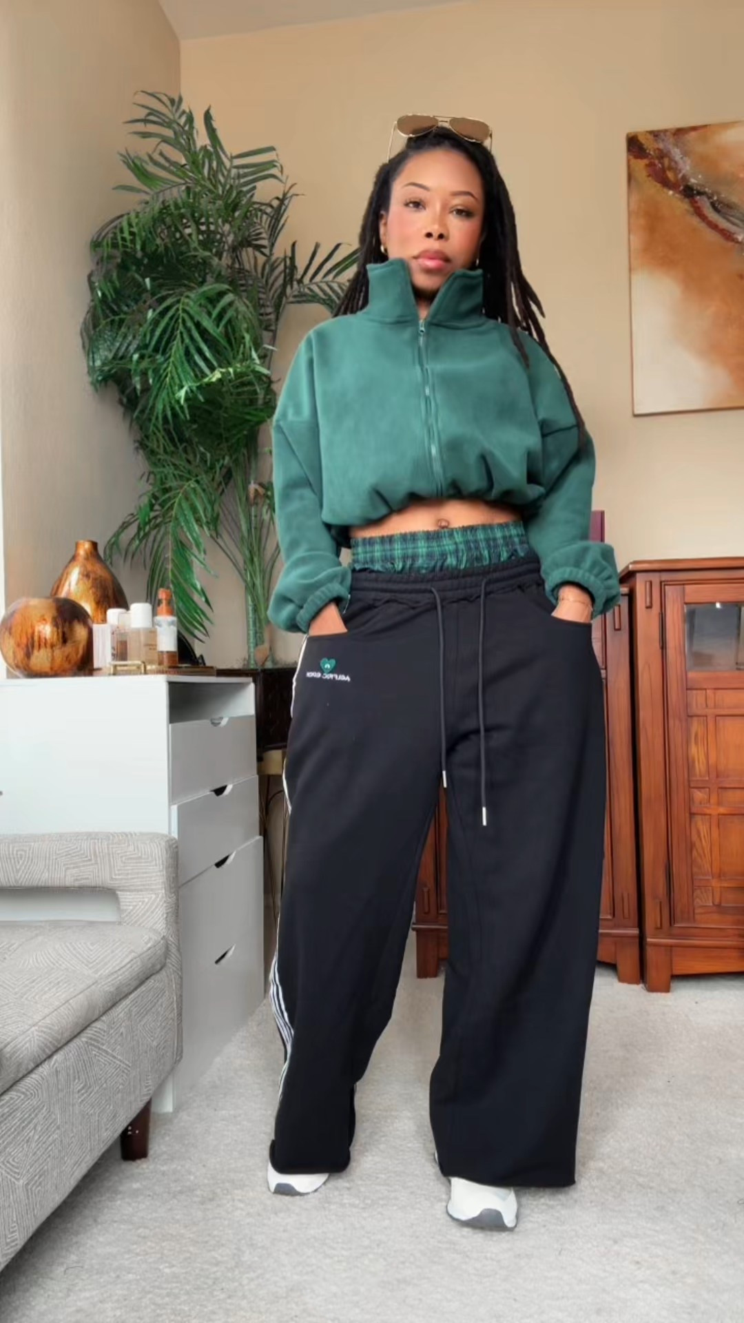 This is the qinsen fleece zip. Super cute! I was skeptical if the top would coordinate with my sweatpants based on the color in the pics, but it was a perfect match 🤌🏾♥️. 

#LTKPetite #LTKActive #LTKootd