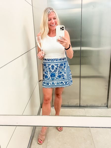 Love this blue and white embroidered skirt with a white tank top and tan sandals. Size small skirt and medium tank top. Tank runs small size up.

#LTKSeasonal #LTKTravel #LTKStyleTip