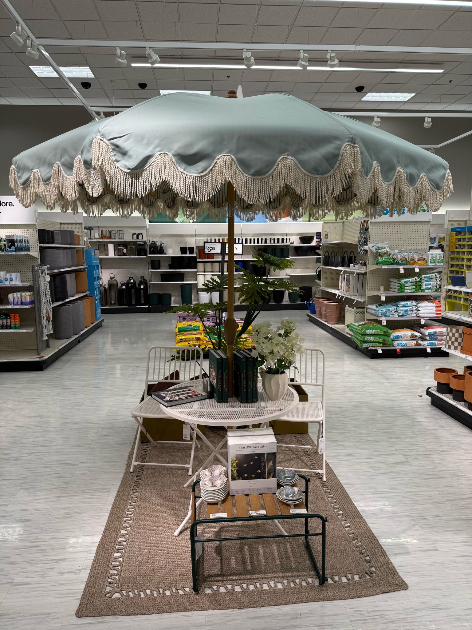 Outdoor fringe umbrella ⛱️

#LTKSeasonal #LTKHome #LTKSwim