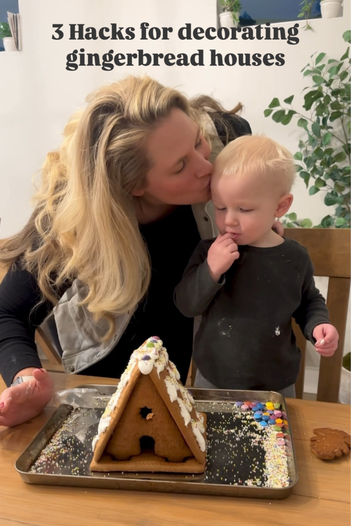 The hot glue gun and rimmed baking sheet I used when decorating gingerbread houses with my kids. 

The gingerbread houses are from Trader Joe’s! Great and affordable, but you do have to mix the icing yourself  
