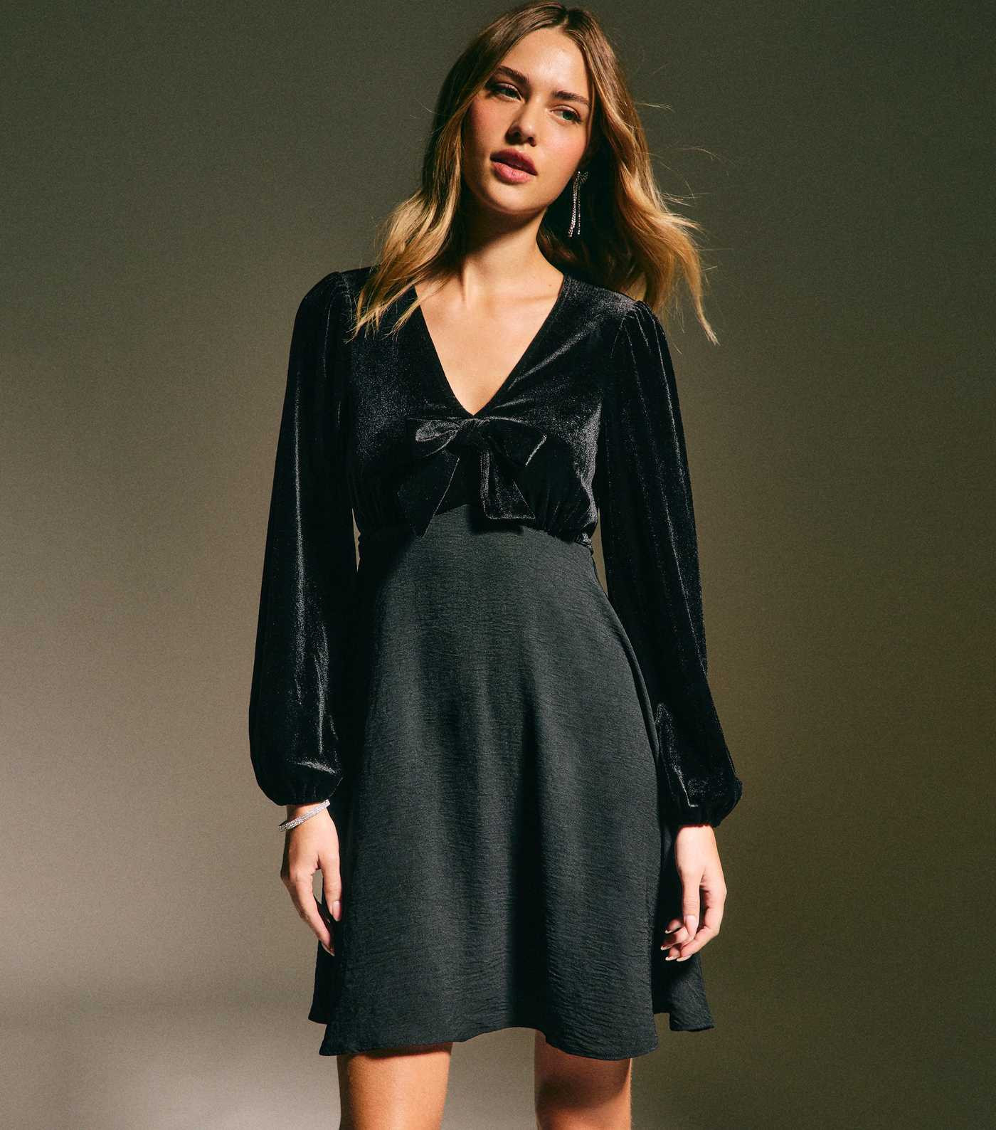 Black Long Sleeve Velvet Bow Front Mini Dress | New Look | New Look (UK)