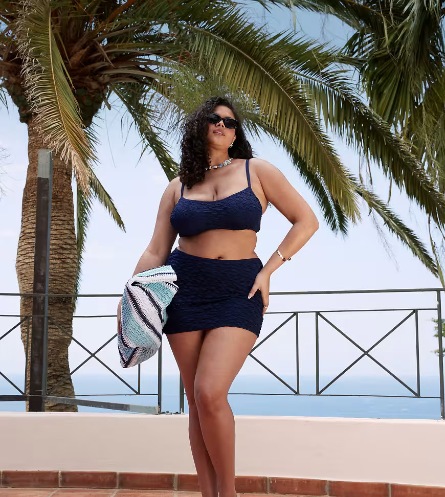 ASOS DESIGN Curve courtney textured swim skirt in navy | ASOS (Global)